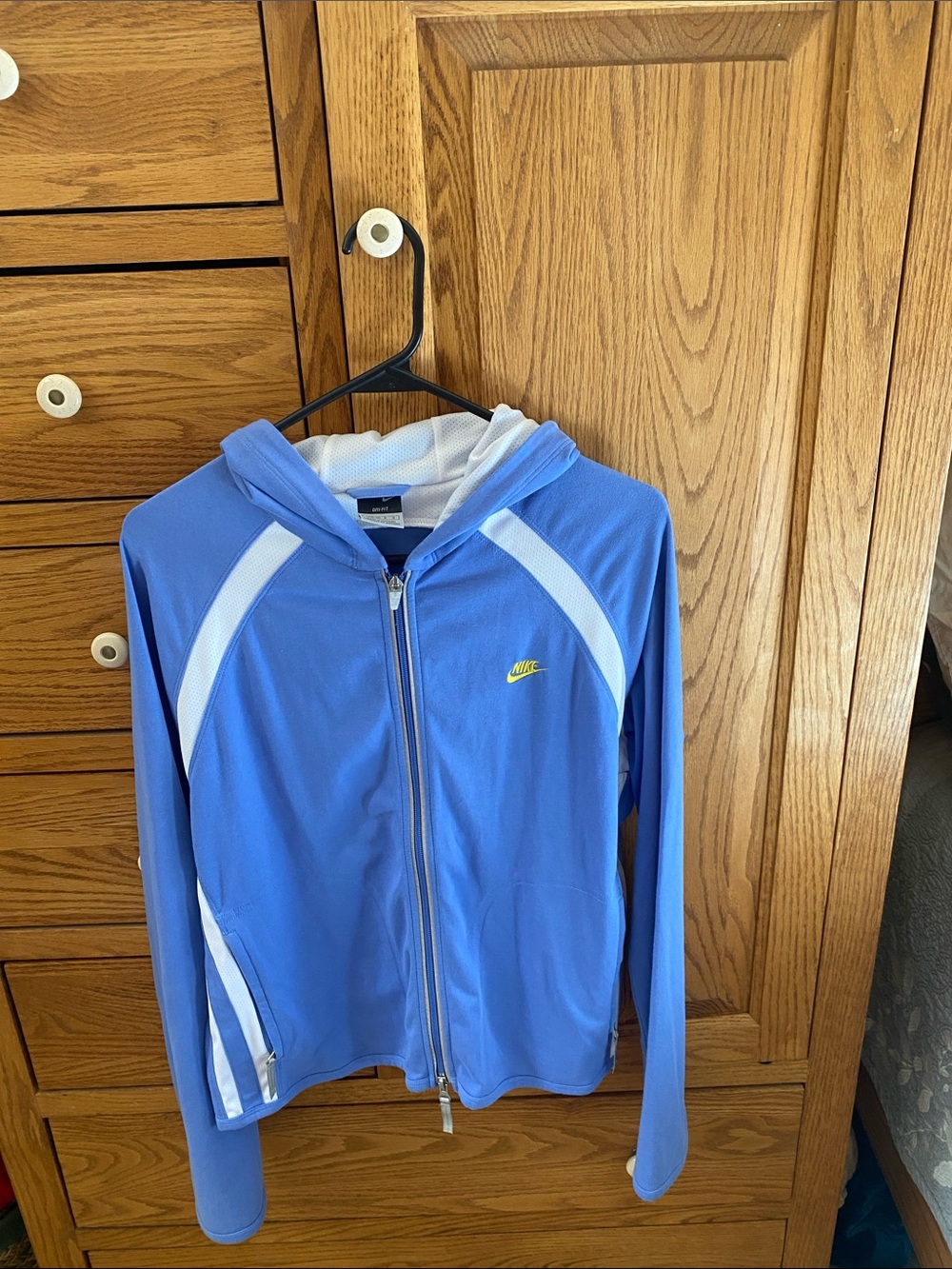 Nike Light Blue Hooded Zip Jacket with White Panels and Yellow Swoosh
